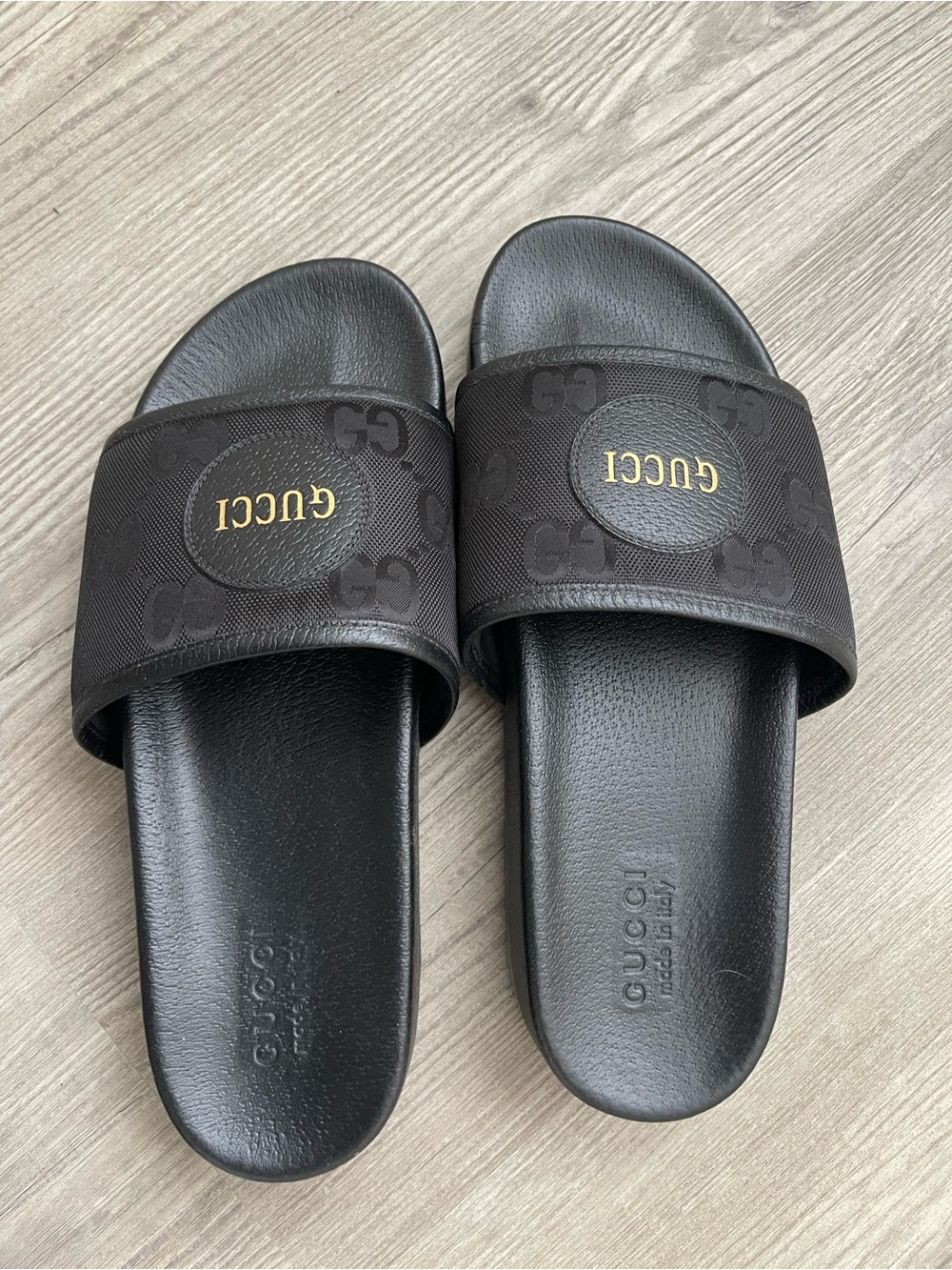 Gucci Black Slide Sandals with Gold Logo